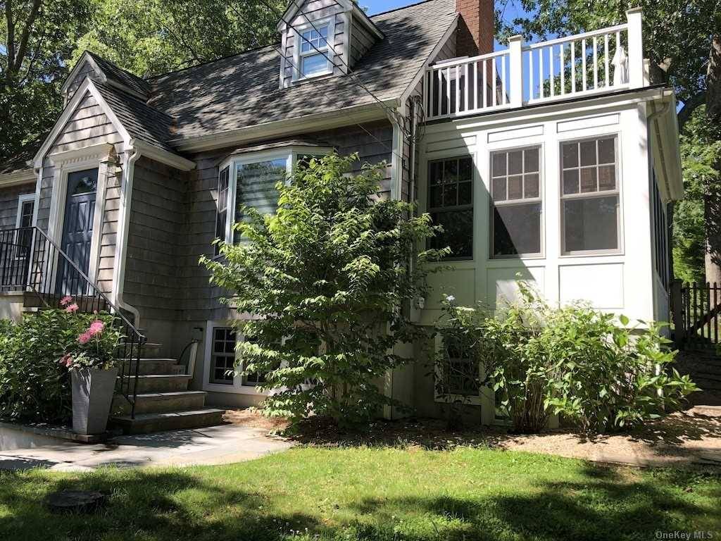 Beautiful Cape Cod House Totally Updated With 3 Bedroom and 3 Full Baths on Three Levels.