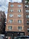 View of apartment building / complex with cooling unit