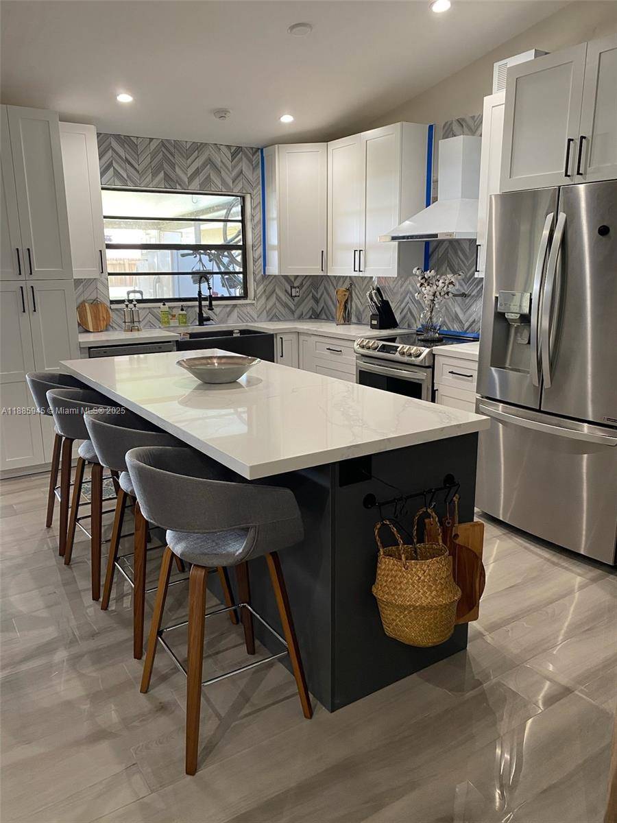 Welcome to your dream home in the heart of Kendall !