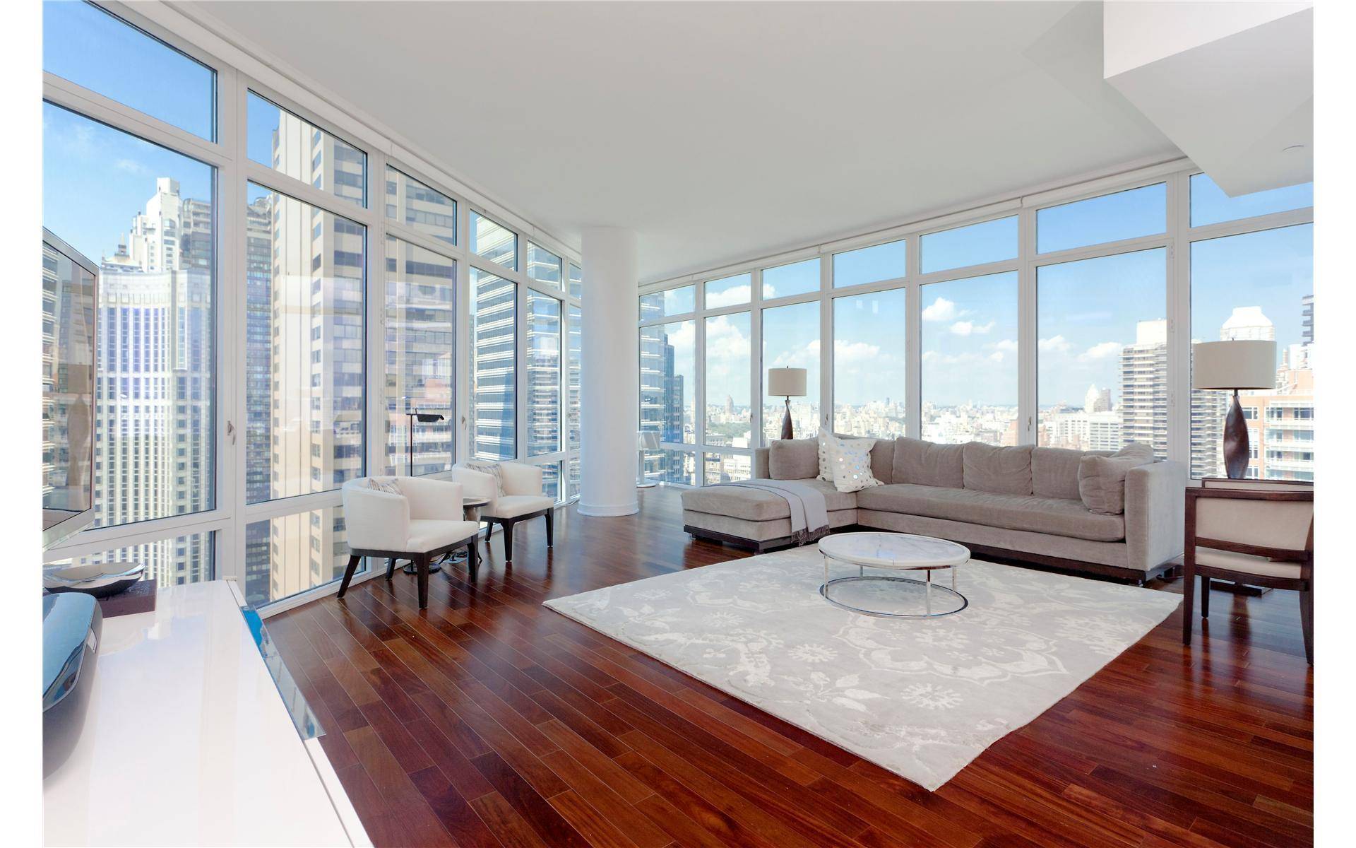 Sweeping views of Manhattan and tips of Central Park, 10' high ceilings in one of Midtown's luxurious Boutique Condo bldgs.