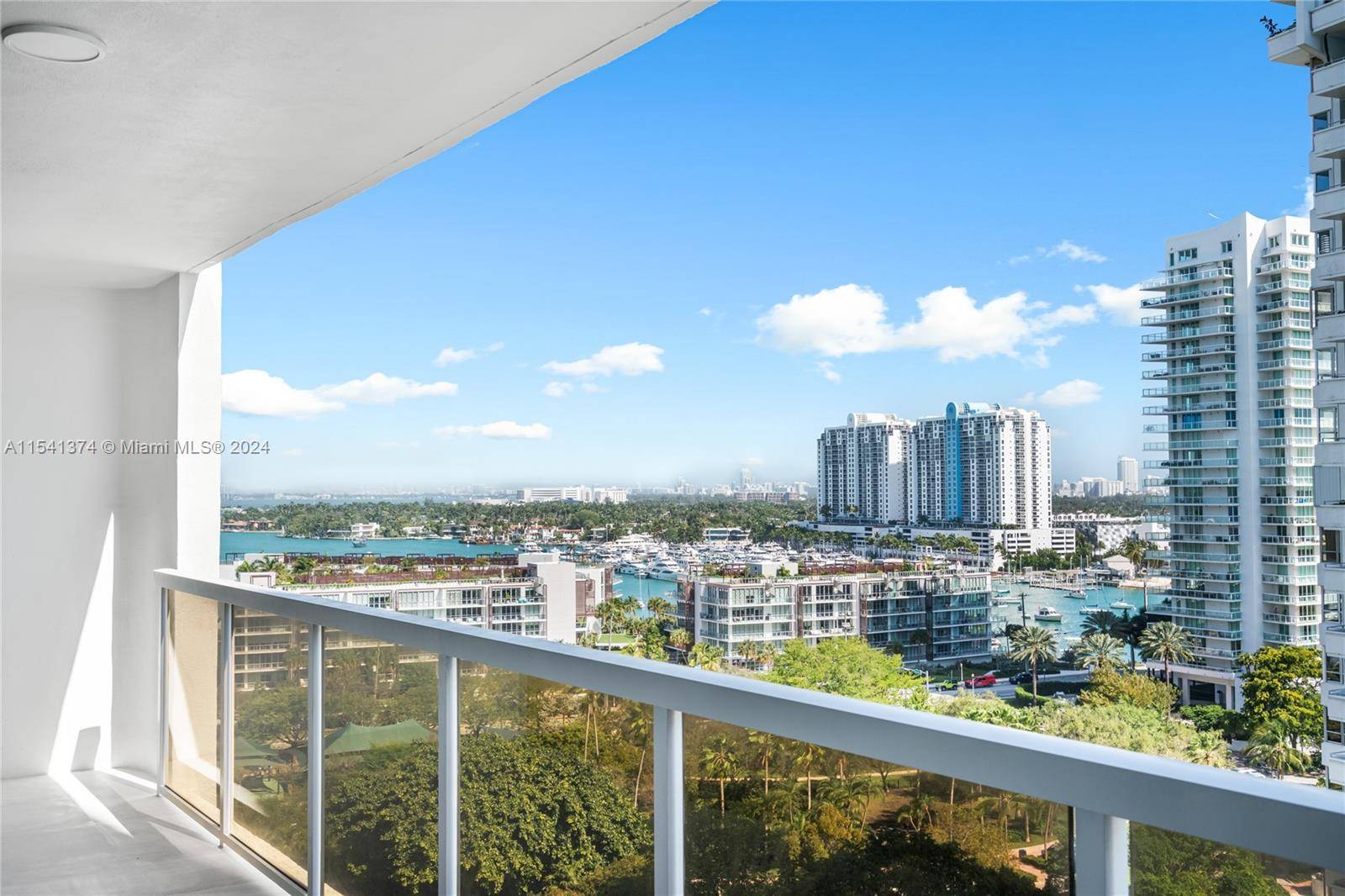 Spacious residence at 9 Island Condo 2 Bed, 2 Baths with an open terrace with views of the city and bay.
