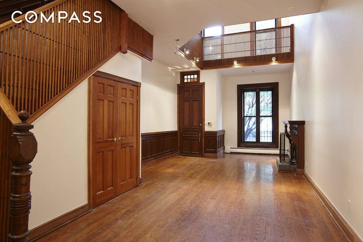 Impressive townhouse triplex offering space, flexibility, and three working fireplaces all in the heart of Harlem !