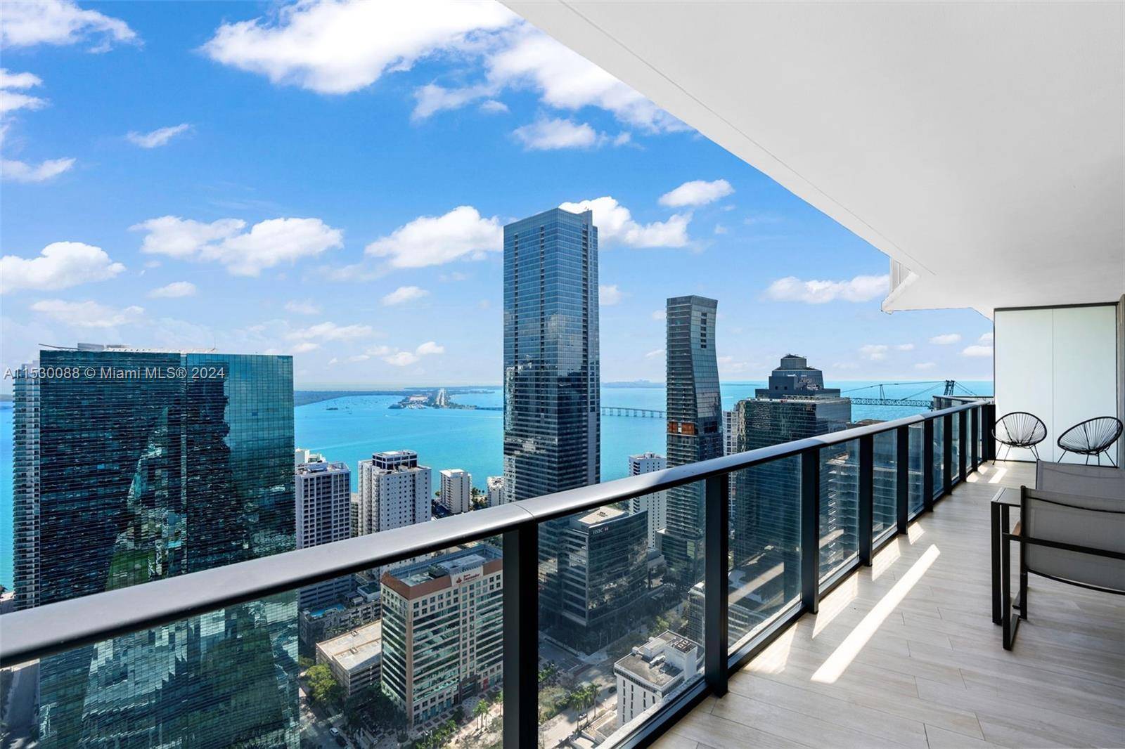 Enjoy unobstructed Bay and Skyline views from this spacious 2BR DEN, 2 bath unit at SLS Brickell.