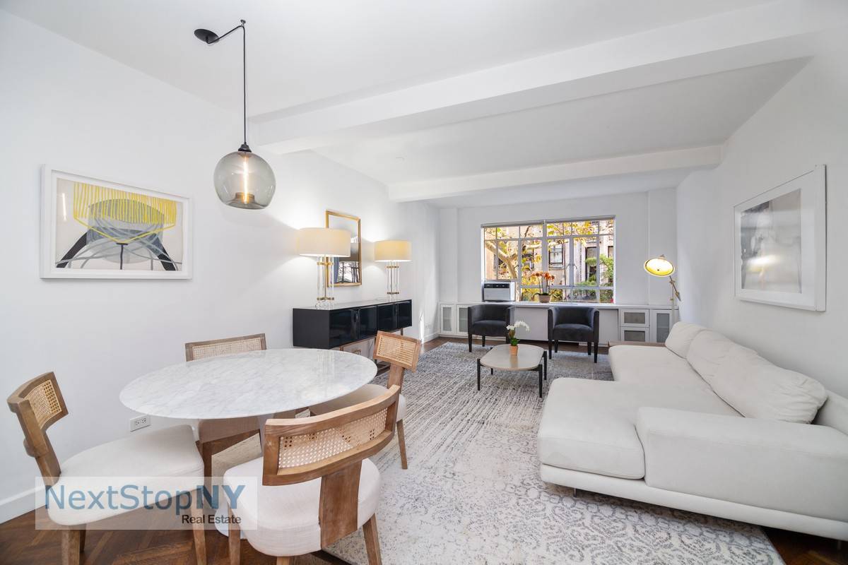 This exquisite 2 bedroom, 2 bathroom residence showcases original oak herringbone floors, beamed 9 feet ceilings, and well proportioned rooms that create a highly desirable living space.