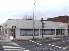 Four Unit Commercial Building right on the corner of Main and Riverside across from new medical building.