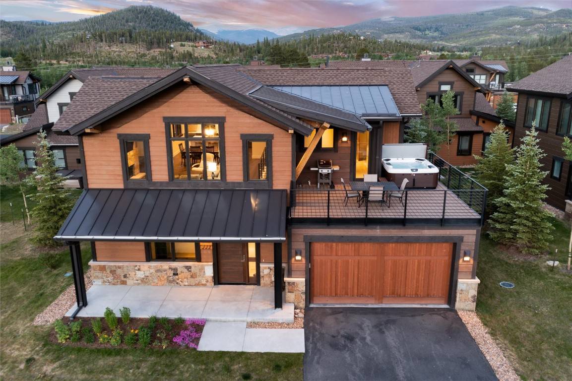 Under breathtaking vistas of the Breckenridge Ski Resort, and set along the shores of the Blue River, this stylish, mountain modern home awaits.