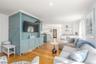 Living area featuring light wood-style flooring and recessed lighting