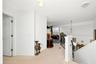 Stairs to bedrooms, loft and office