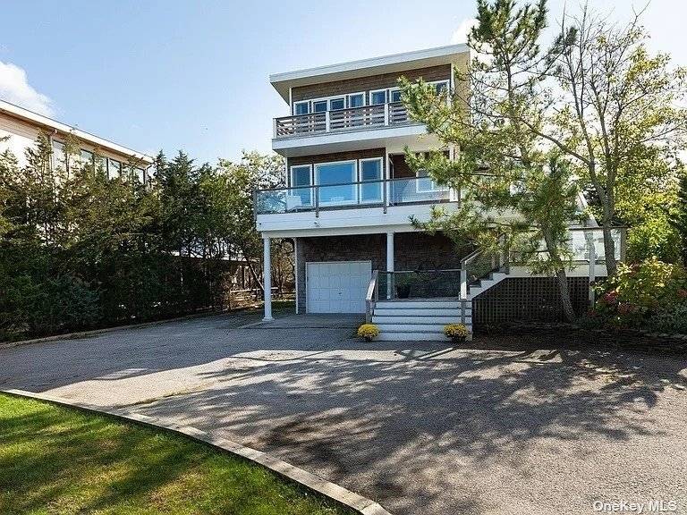 Opportunity to live your dream in this turn key OCEAN FRONT house located between the bridges in Westhampton Beach.