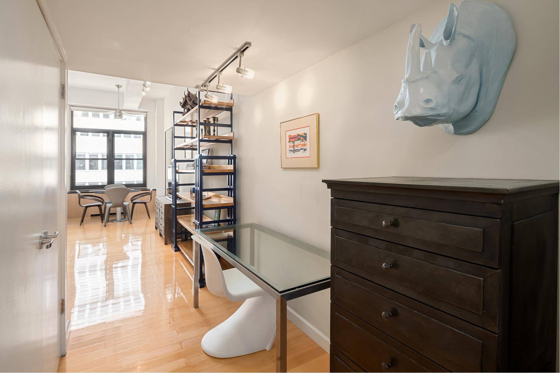 New to market ! This stunning studio features dramatic 12 foot ceilings, oversized windows, an abundance of closet space, separate dining area and more.
