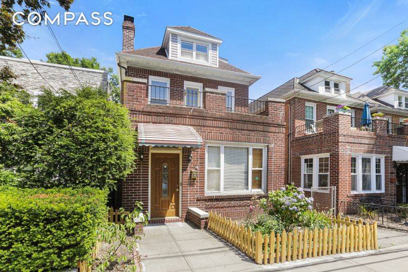 Two Family Home in the heart of North Riverdale one block from Riverdale Avenue.