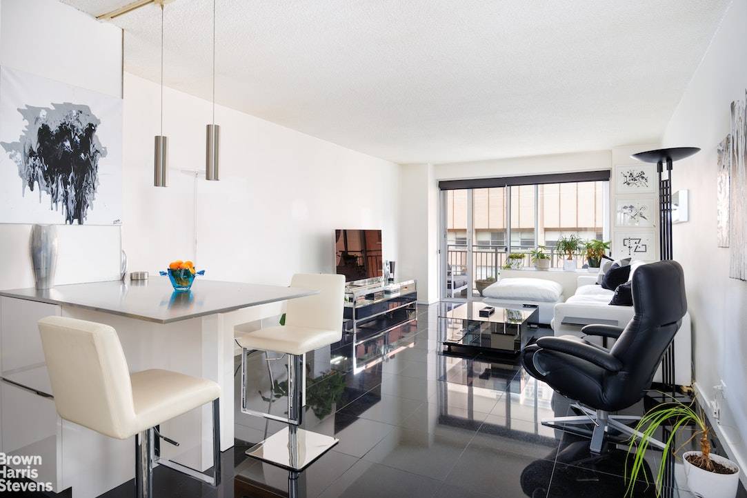 With a sleek and sophisticated design, plus a large balcony, Apt.