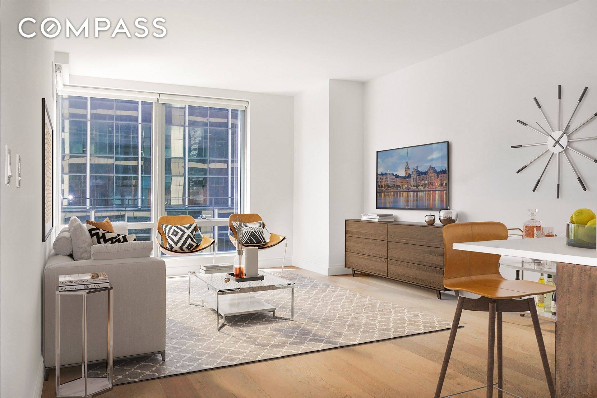 New 1 bedroom with corner floor to ceiling living room window, gourmet chef's kitchen with Caesarstone countertops, stainless steel appliances and eating bar, and two walk in closets.