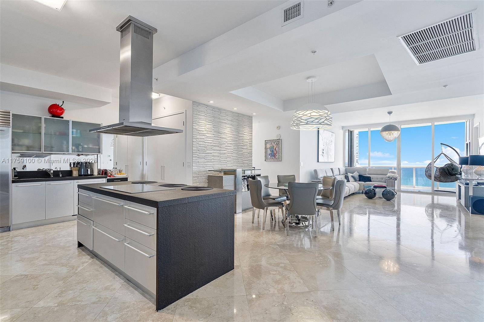 The essence of beachfront luxury living in this exceptional 3 bedroom, 3.
