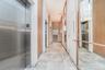Corridor featuring elevator and recessed lighting