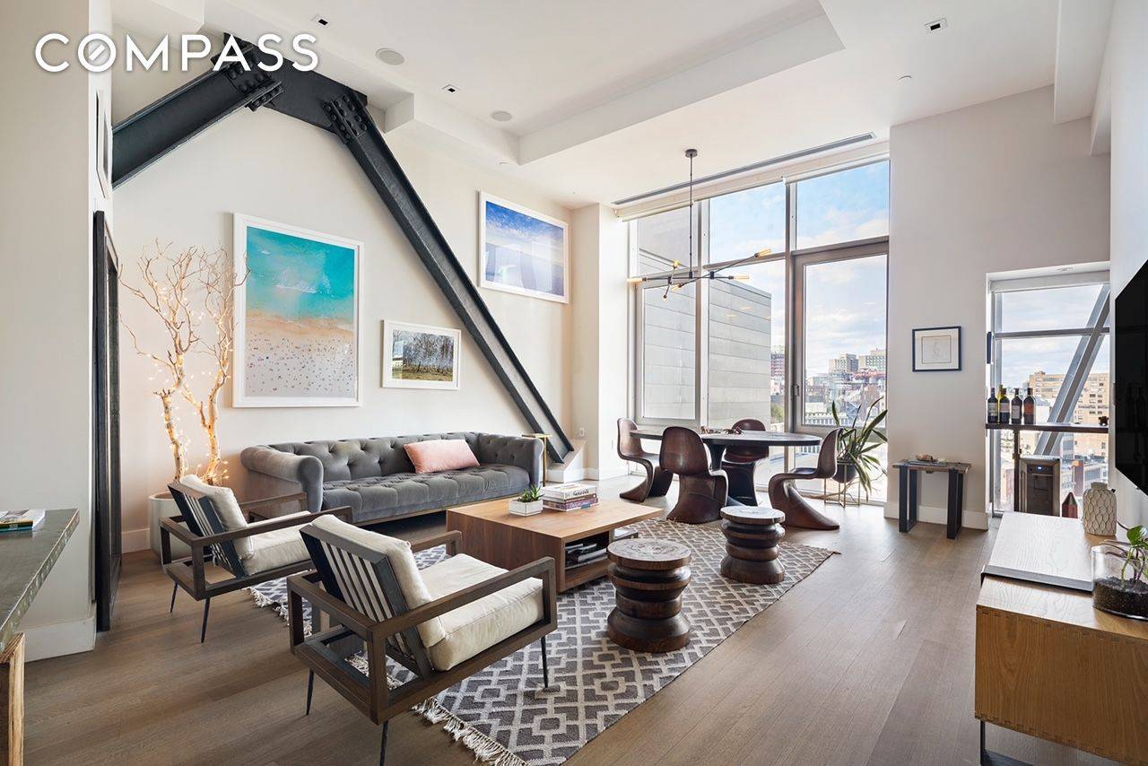 Experience the epitome of modern luxury in this stunning full floor condominium located in the vibrant heart of the Bowery.