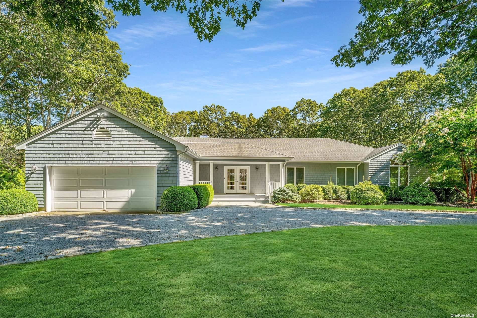 Pull up to a charming four bedroom house in Quogue.