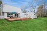 Outdoor deck are by tennis court