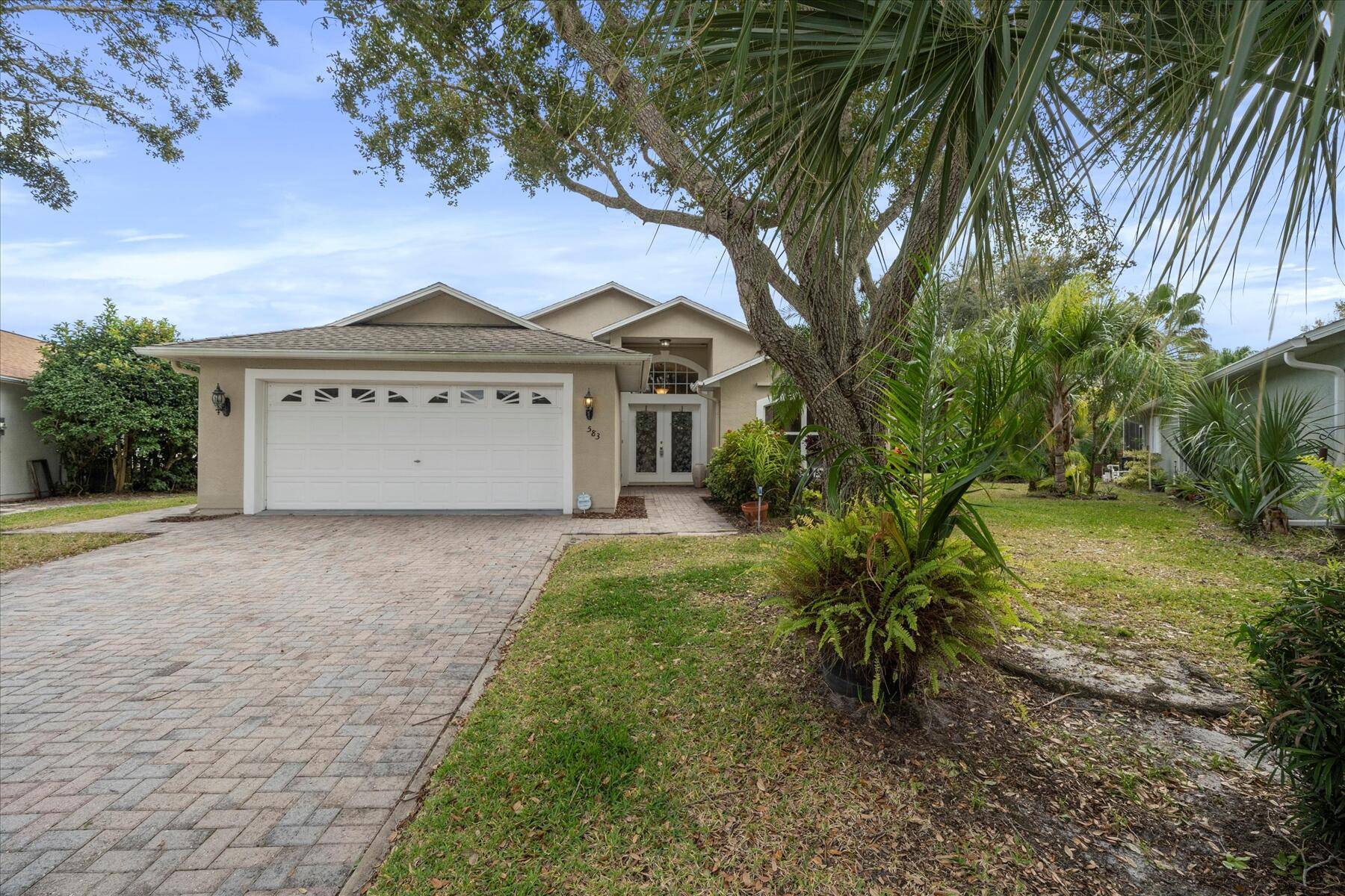 Located in the exclusive gated community of Collier Club features this impeccably maintained, solidly constructed CBS home, boasting a thoughtfully designed split bedroom layout, seamlessly flowing open concept living, dining, ...