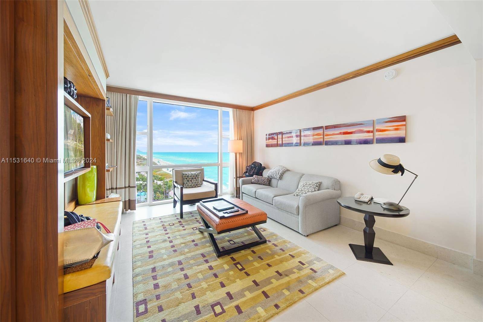 Stunning ocean beach view hotel suite turn key unit at Carillon Miami Wellness Resort, a premier oceanfront luxury property.