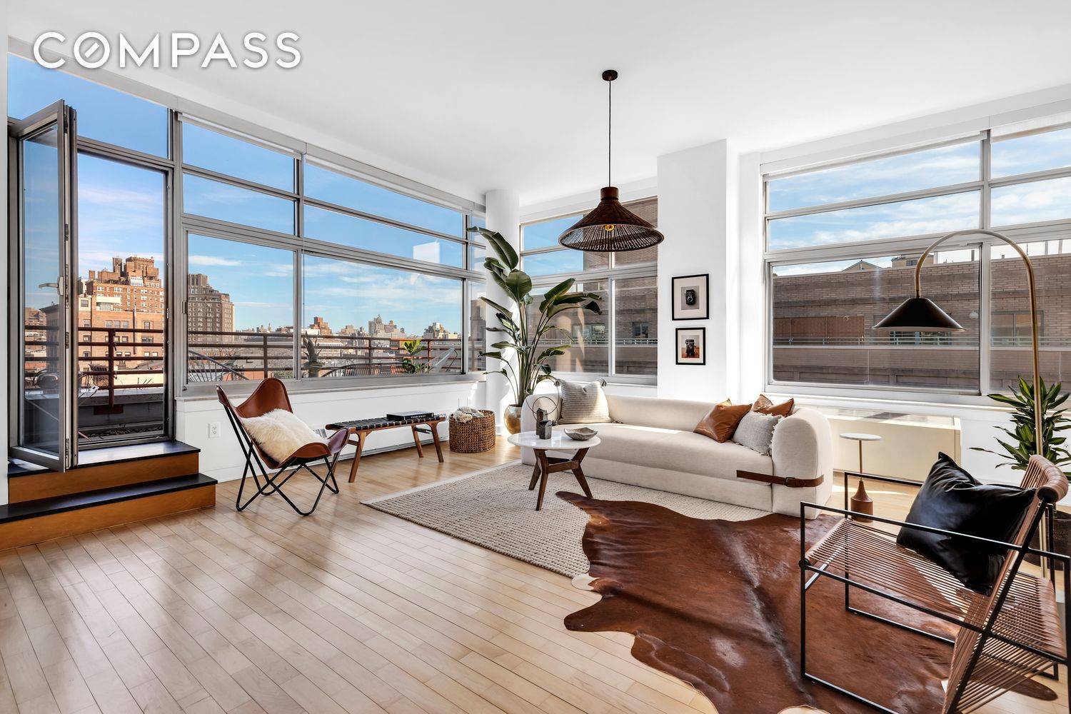 Iconic 2000sf space w private terrace Perched overlooking the West Village, enjoy sun filled, loft line living in the tower section with 11 foot ceilings.