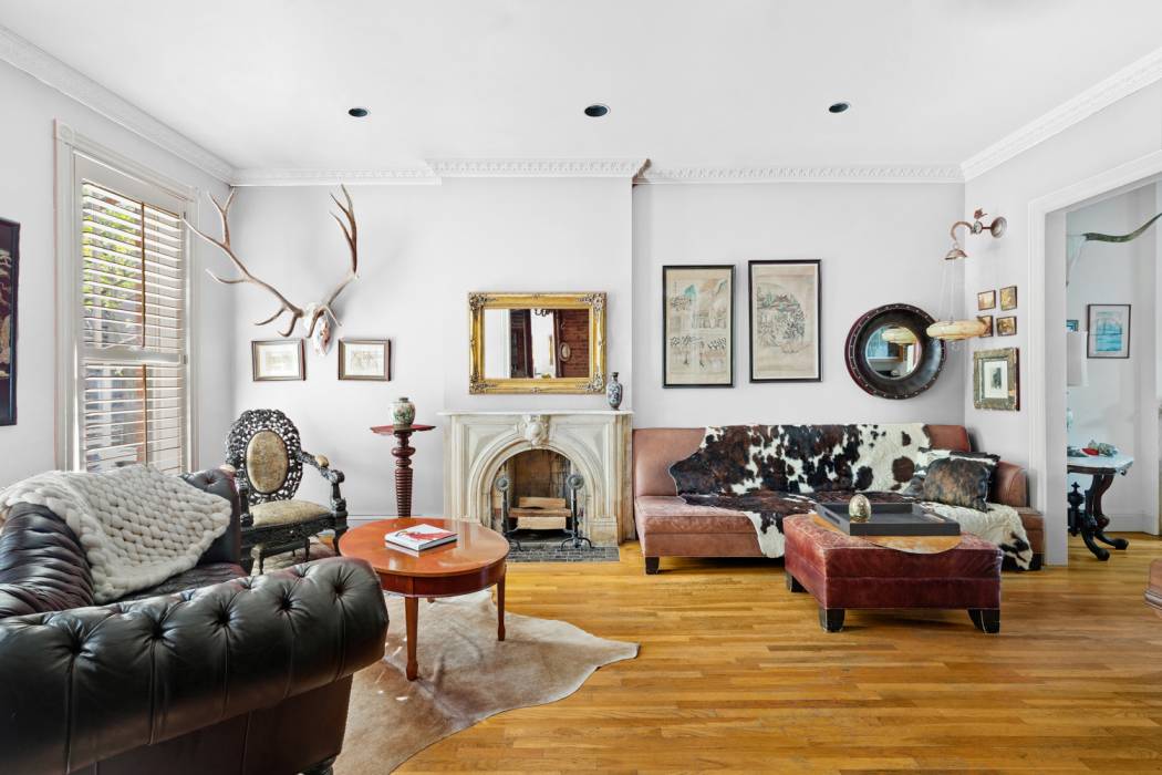 Well proportioned and roomy, this graceful four story, two family townhouse embodies the relaxed and trendy vibe of Boerum Hill.