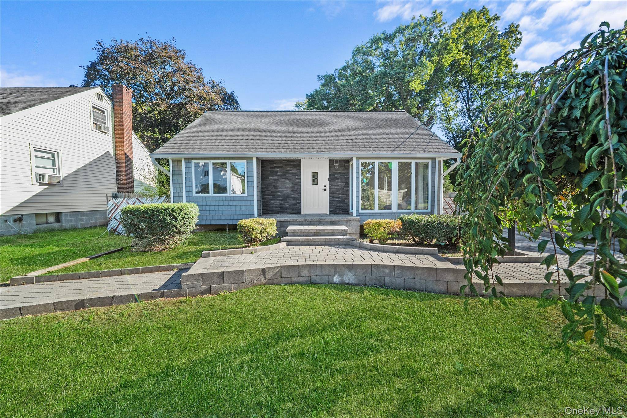 Welcome home to this tastefully renovated 4 bedroom, 2 bath Cape set on a 10, 800 sq ft fenced in property in Huntington Station !