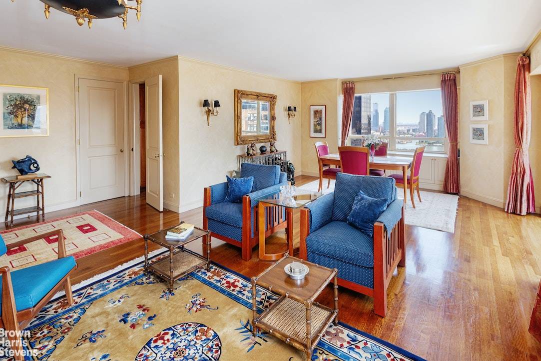 Spectacular East River and iconic city landmark views from three exposures east, south and west from this grand, high floor, three bedroom, 3.