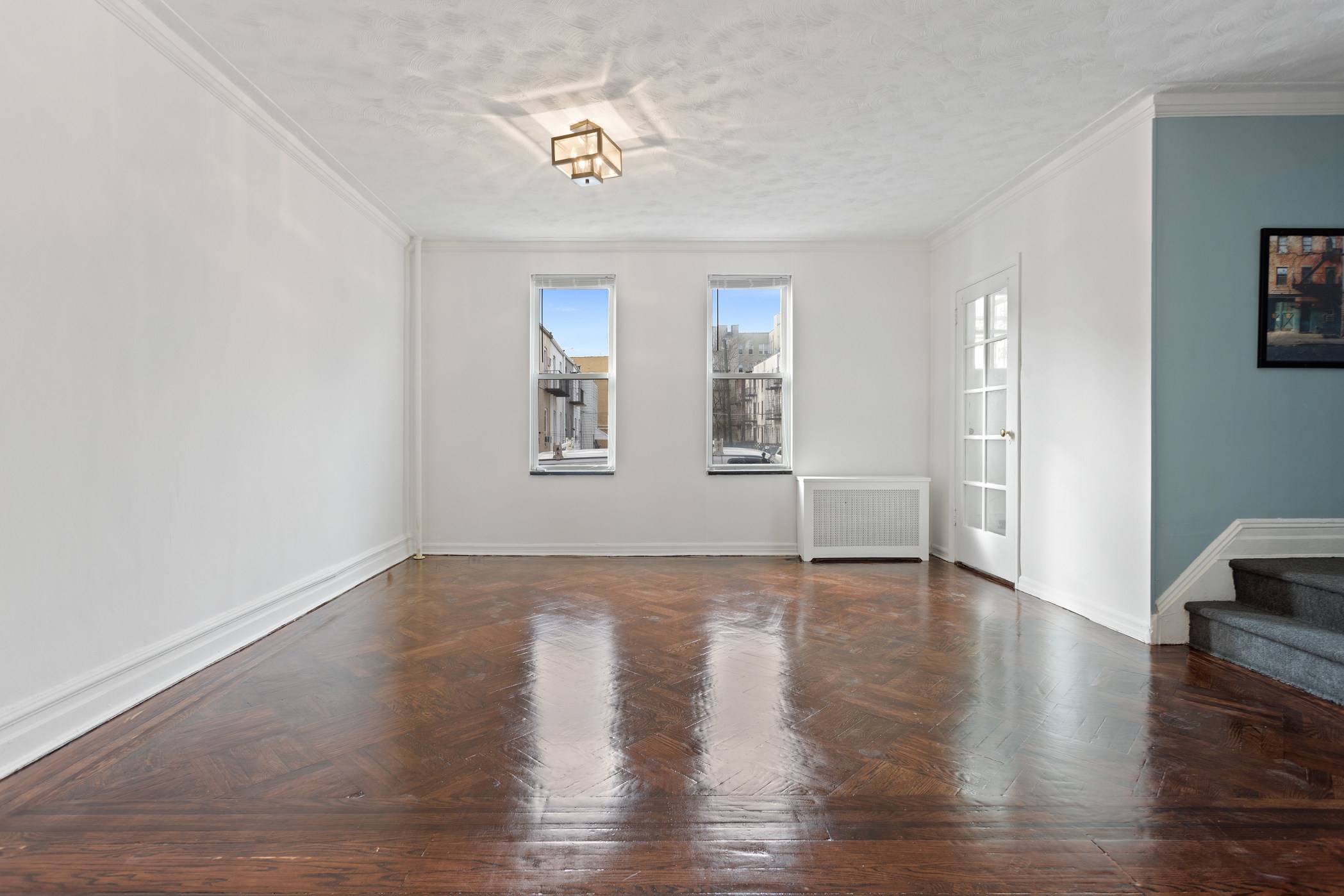 Welcome home to this gracious brick townhouse located in the heart of Bay Ridge.