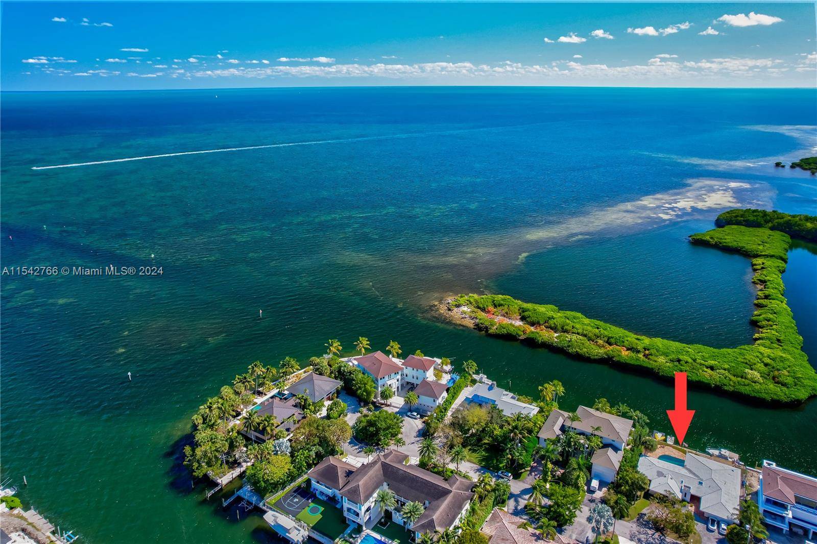 Boater's Paradise ! A 12, 000 square ft lot with 100 linear ft seawall.