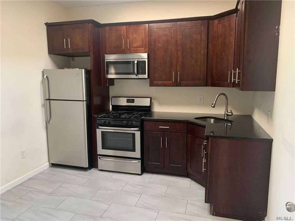 Newly renovated 1 bedroom apt with hardwood floors and tile.