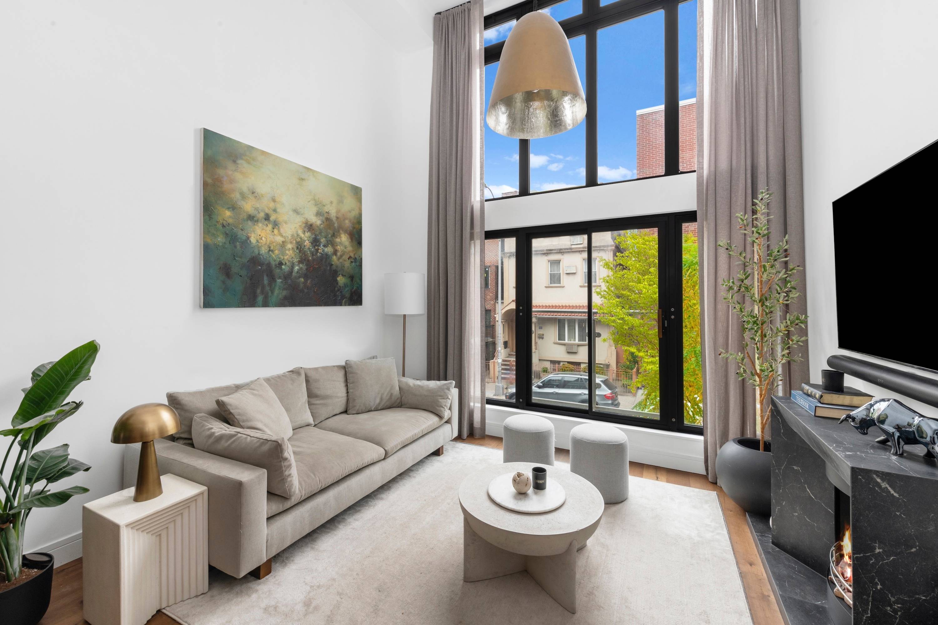 Welcome to Unit 2C at the Evry, a stunning east facing duplex in the heart of Williamsburg.