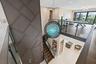Custom floor to ceiling wall design. Wood floors on stairs and second floor