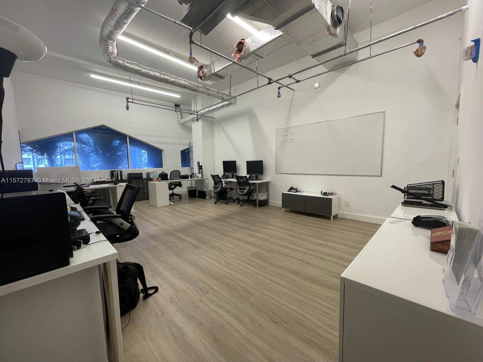 Newly renovated 1007sqft office with two separate offices, break room with a kitchen and an enclosed waiting reception area in a beautiful and secure residential condominium The Pavilion in Miami ...