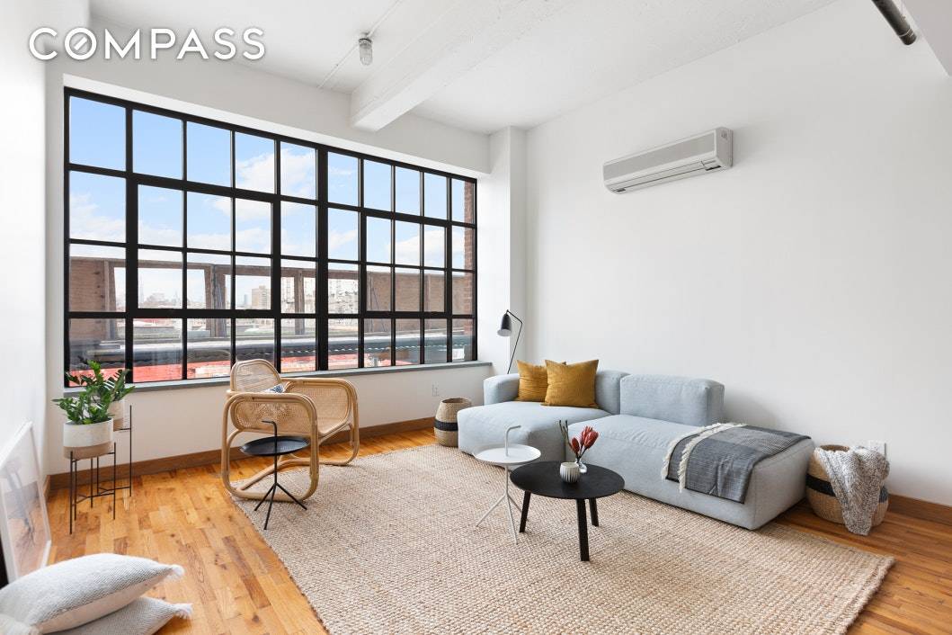 Industrial Chic and Fabulous Rarely available, this oversized loft easily functions as a 1BR with home office.