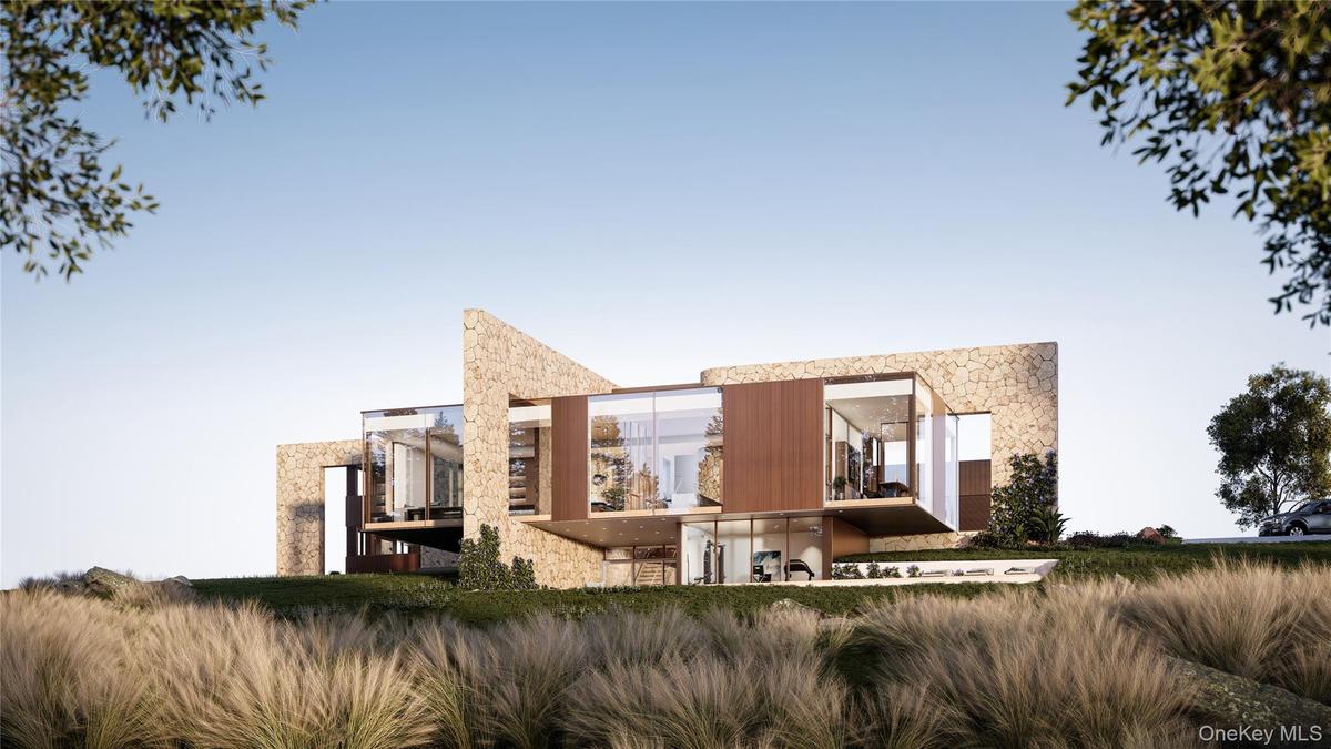 Two hand-laid stone feature walls define the architectural experience