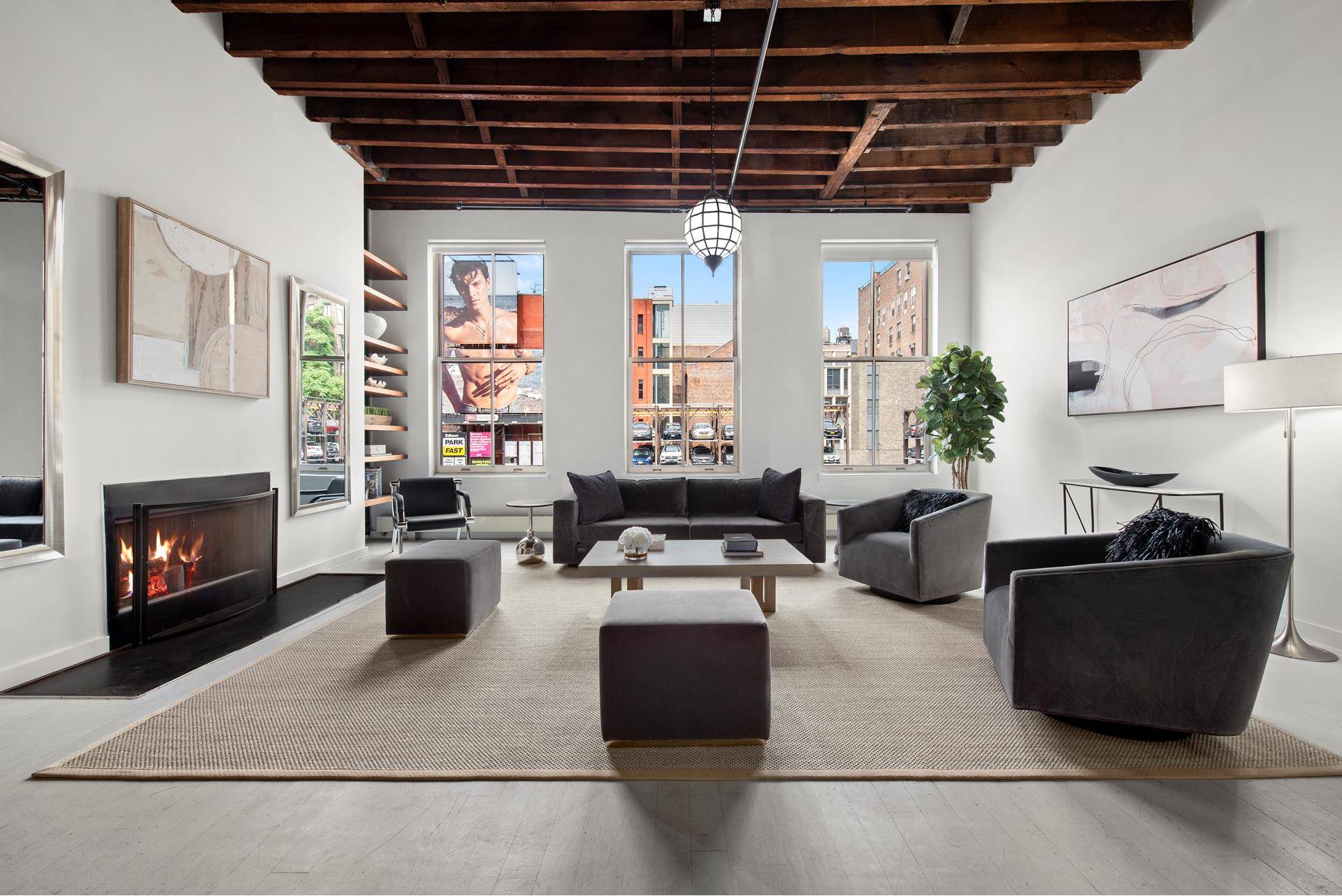 Welcome to this classic two bedroom condominium NoHo loft, with wood burning fireplace, private outdoor space, central air and private laundry a true find nestled in a landmarked neighborhood.