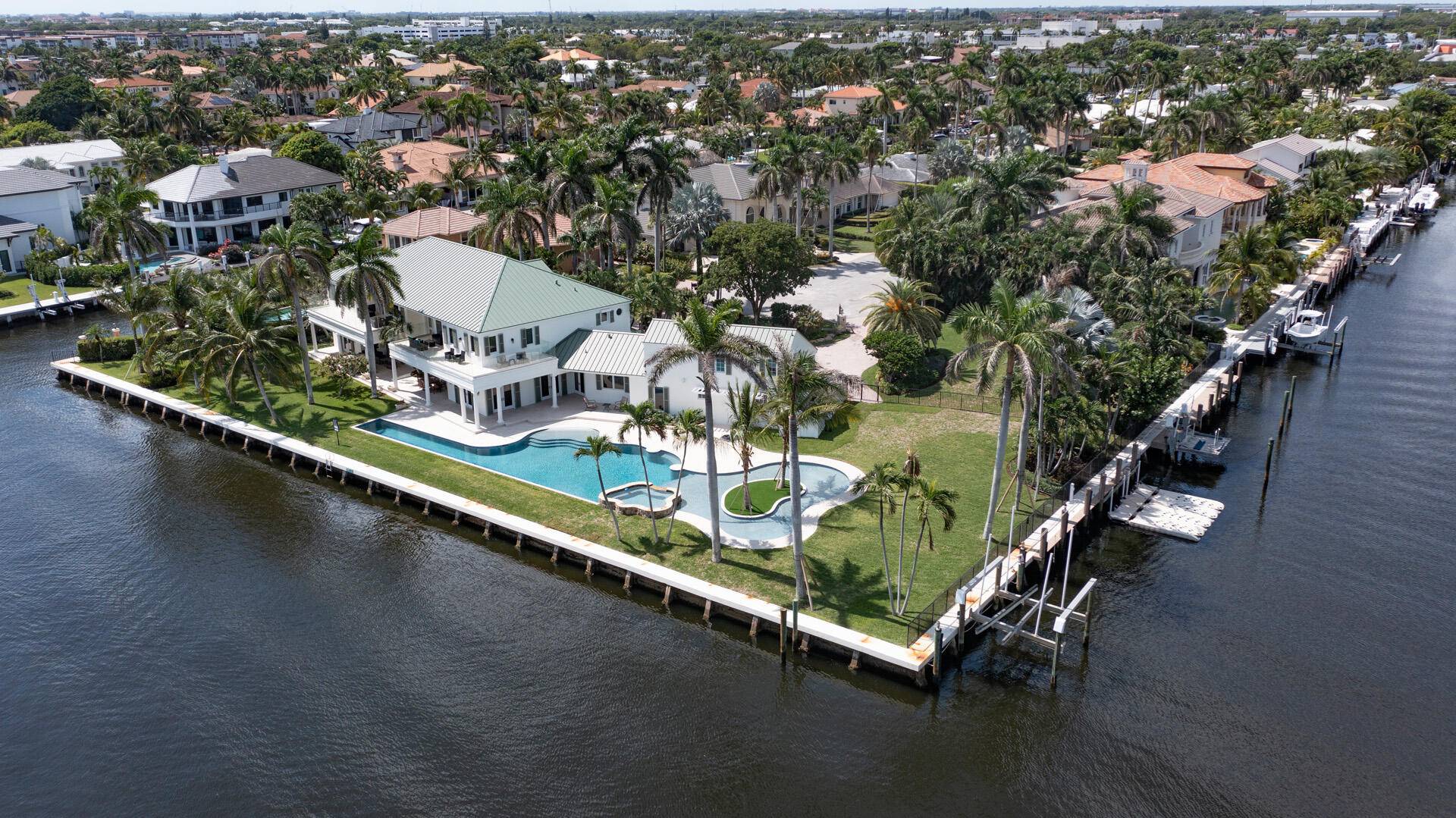 Embraced by 450 feet of glorious waterfront, this one of a kind triple lot Intracoastal point estate personifies resort at home living in a sprawling realm seeming like a private ...