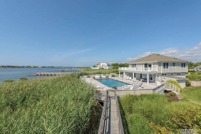 Fall Rental. Fabulous four bedroom, three and a half bath home on the bay with panoramic water views.