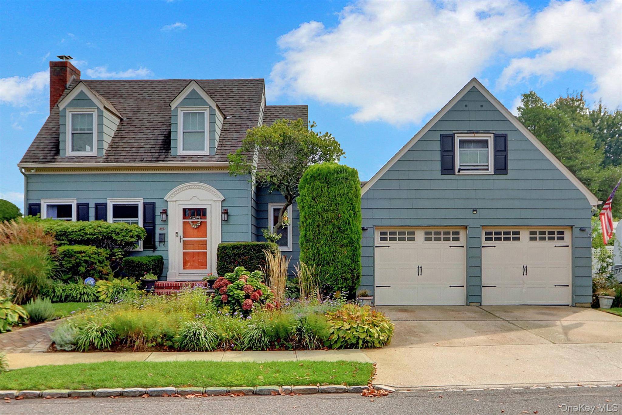 Welcome to this beautifully maintained Colonial that perfectly blends classic elegance with modern comfort.