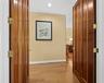 The double door entrance into the primary besdroom