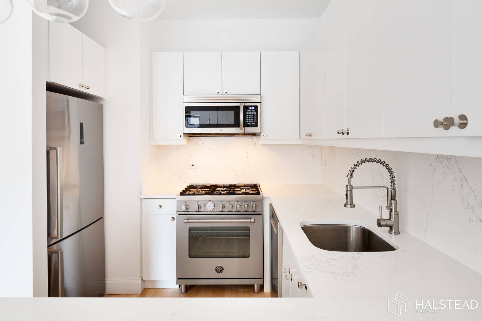 A stunningly renovated two bedroom condo in the center of the South Park Slope.