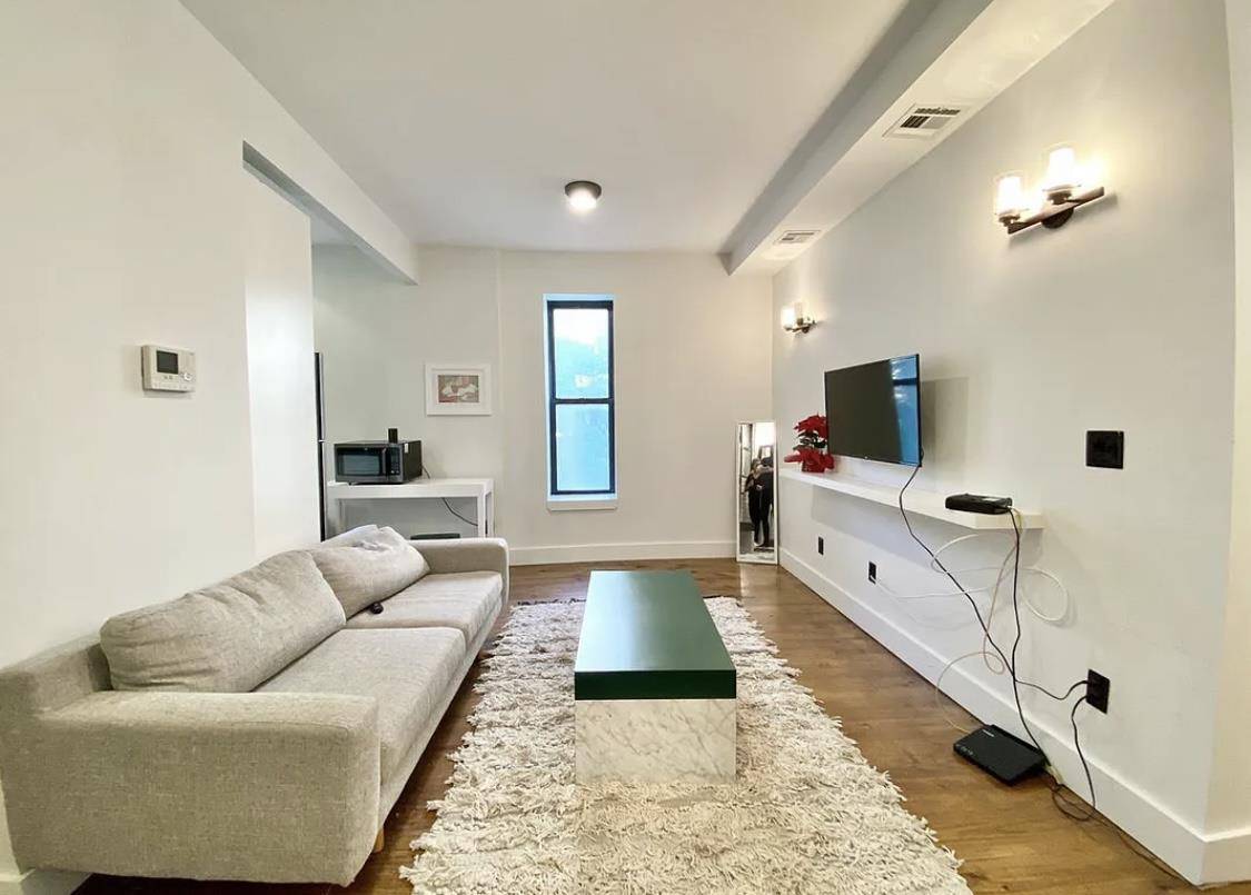 Beautifully Gut Renovated 5 Bed 2 Bath Apt with Condo FinishesNew Kitchen With Stainless Steel Appliances and a Dishwasher2 Full BathroomsSpacious BedroomsHardwood Flooring and High CeilingsCentral Heat and ACOn Site ...