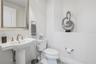 Convenient powder bath off the main living area.