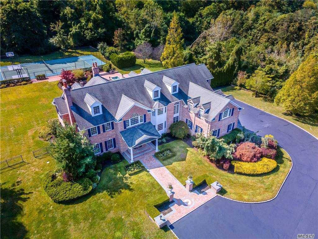 Style, Luxury, And Ambiance Awaits You In This Resort Style Home On Over 2 Pvt Acres Of Lushly Landscaped And Lit Grounds In The Heart Of Muttontown.