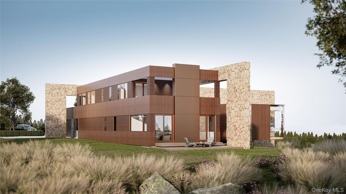 Stunning contrast between natural stone cuts, anodized bronze, sustainable Accoya wood and expansive glazing