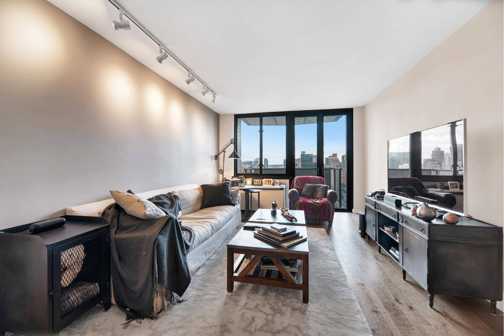 This fabulous high floor one bedroom one bath apartment with open city views is spaciously comfortable and in mint conditon, with large east facing windows inviting in generous light, and ...