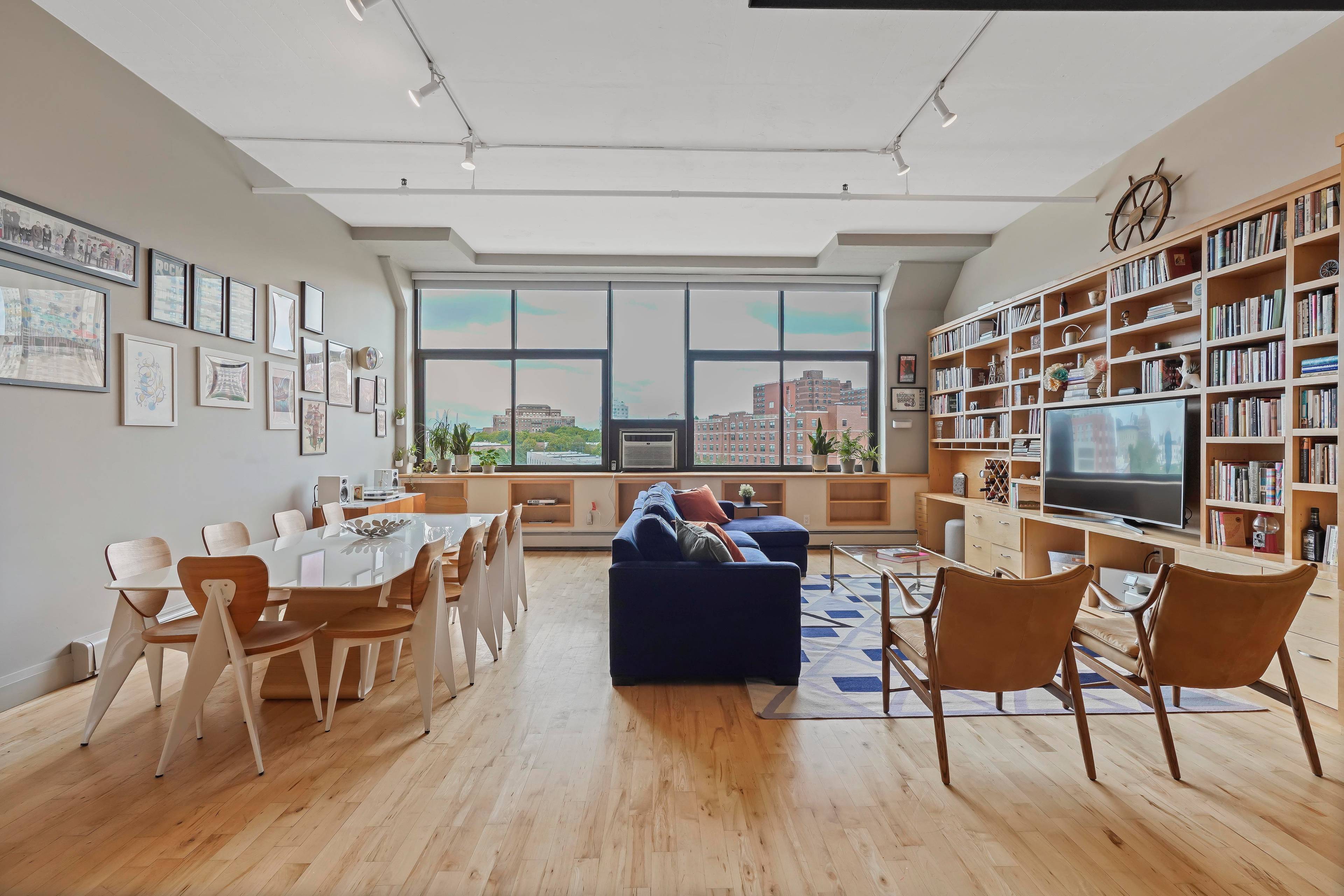 Residence 412 at 535 Dean Street is a converted 2 BR, 1 Bath condominium which features an open floorplan that creates a loft like spatial feeling.