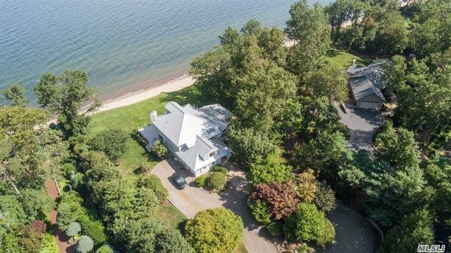 Stunning Waterfront Home overlooking Long Island Sound with unobstructed views of Connecticut and Sunrises and Sunsets, 200 feet of frontage on Beach, Home was a Complete Remodel 2 yrs ago, ...