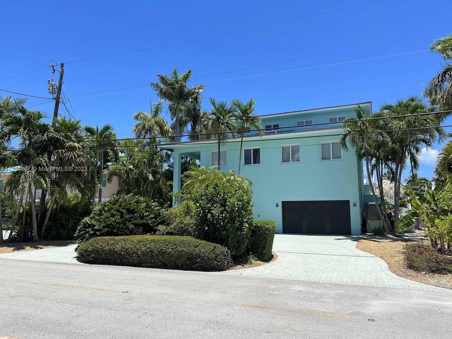 Welcome to paradise ! Only 1100 ft to the ocean inlet, no fixed bridges, 100' wide crystal clear canal, ocean views, 20klb boat lift for up to 43' boat, second ...